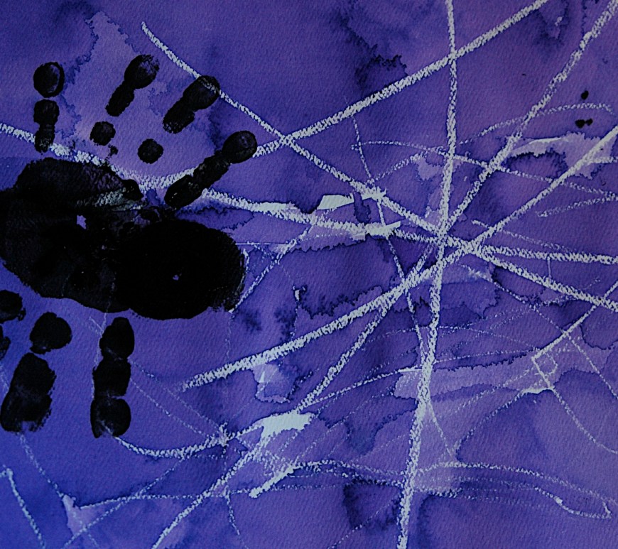 Toddler Art: Using watercolor over crayon resist for halloween Spider Handprint
